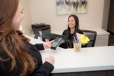 patient paying for an appointment at Walnut Creek Dentists