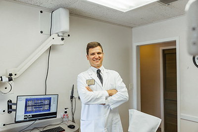 Dr. Jonathan Geleris smiling in the exam room at Walnut Creek Dentists