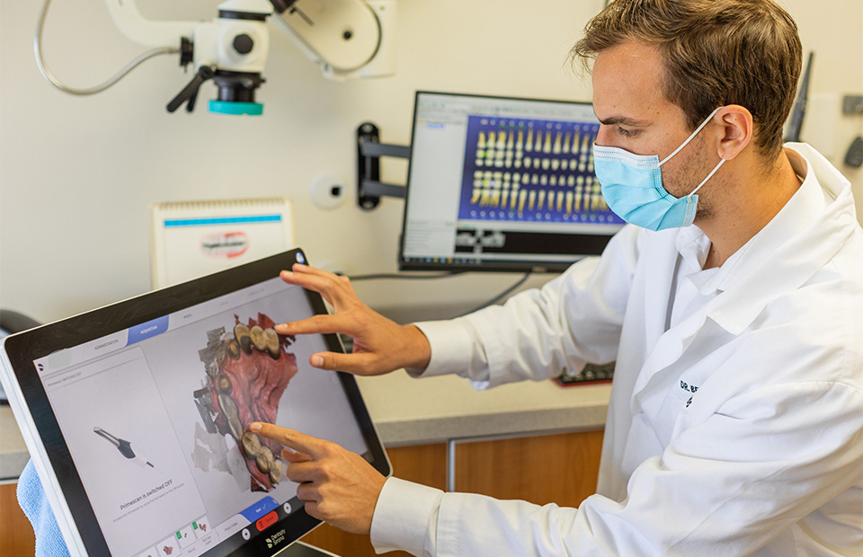 Walnut Creek dentist reviewing a patient's x-rays