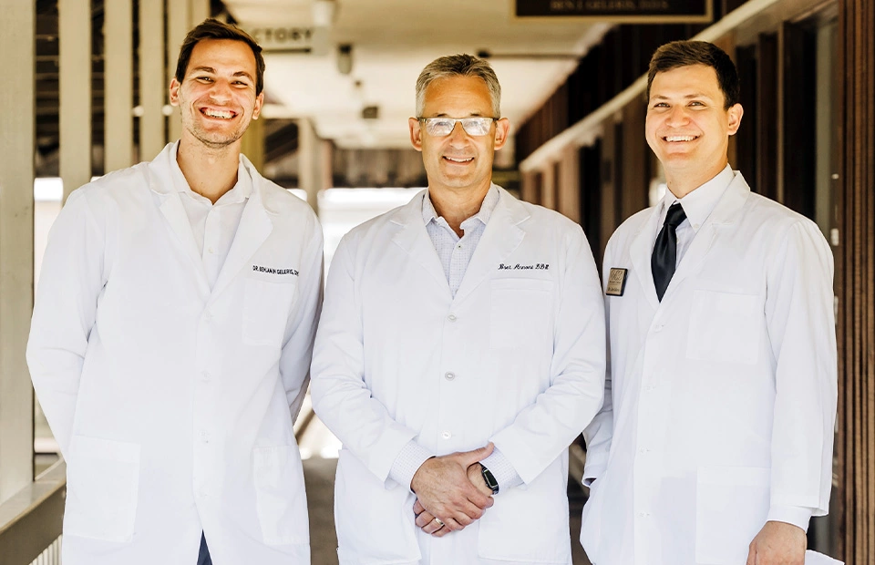 the 3 dentists at Walnut Creek Dentists smiling together - Dr. Annoni, Dr. Benjamin Geleris, and Dr. Jonathan Geleris