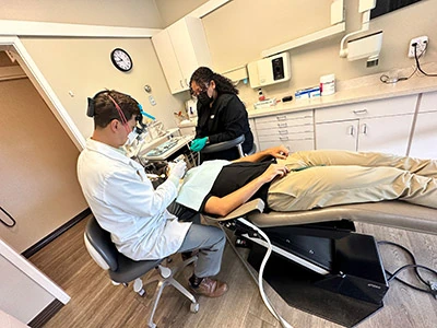 Dentist performing emergency dentistry on a patient at Walnut Creek Dentists